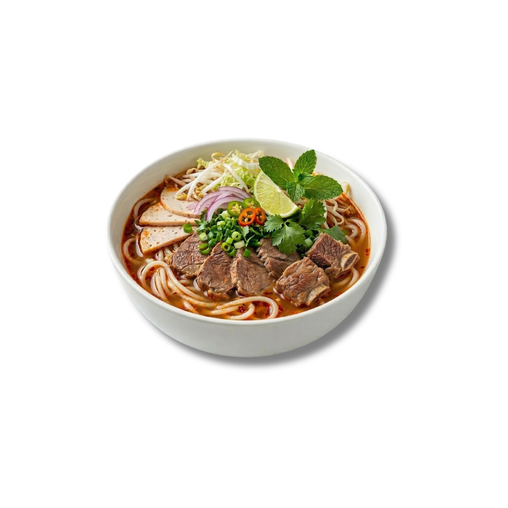 Bún Bò Huế noodle soup with beef, herbs, lime and chili