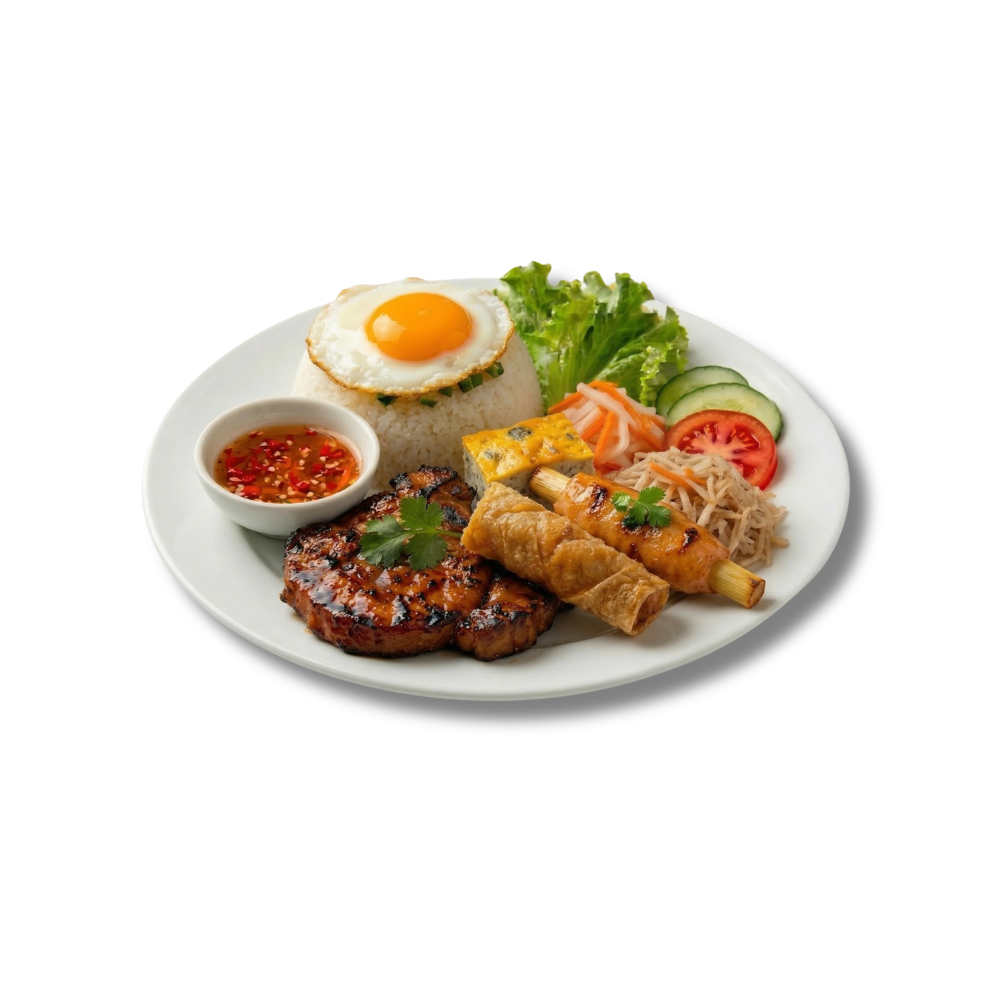Broken rice platter with grilled meat, fried egg, vegetables and dipping sauce